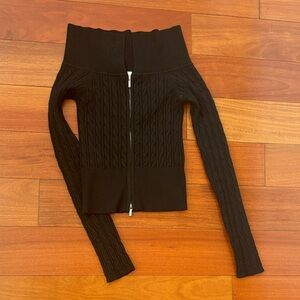 Black cable knit off the shoulder zip up